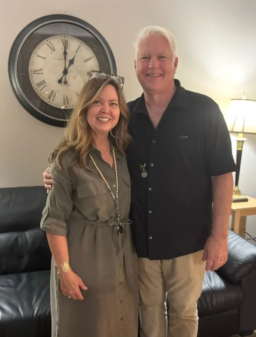 Eric and Monica Wilson standing together